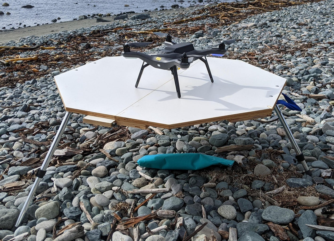 Quadcopter Landing Pad With Telescoping Legs for Uneven Ground